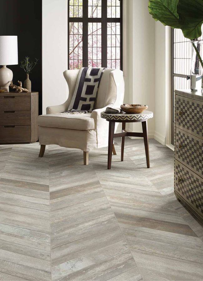 wood look tile flooring in a bright elegant living room