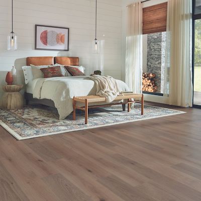 wood look laminate flooring in a charming bedroom