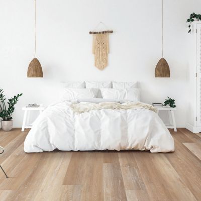 luxury vinyl plank flooring in a bright Wooster bedroom